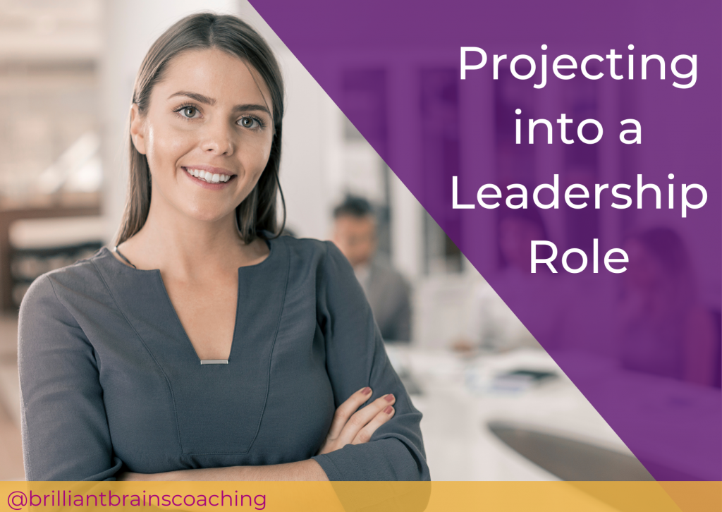 woman with arms crossed projecting into a leadership role
